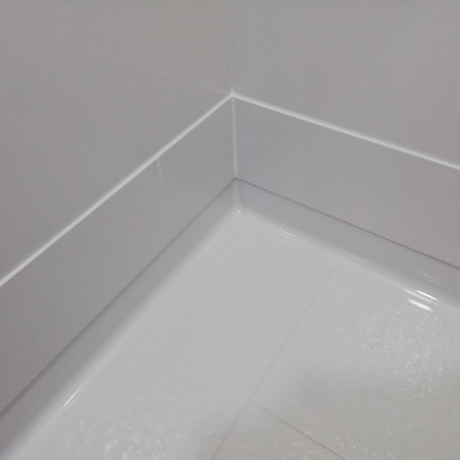 浴室塩ビ鋼板の錆膨れの補修パネル巾木工法